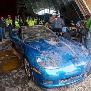 First Corvette Recovered By Crane From Sinkhole At National Corvette Museum